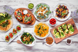 A balanced array of colorful whole food, plant-based dishes